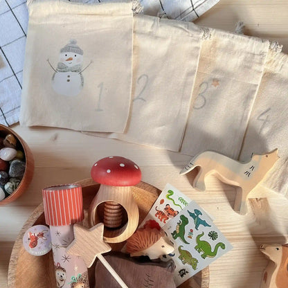 DIY-Adventskalender basteln – mit Bügelbildern und Baumwollsäckchen